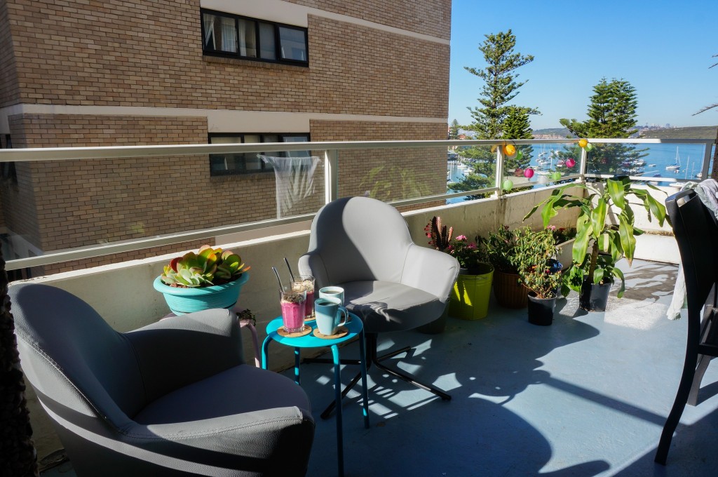 The same balcony photo but taken on a sunny day, with a breakfast display of smoothies & coffees. Small touches & good lighting make all the difference!