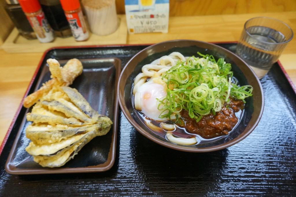 Thick udon noodles in a rich teriyaki sauce, topped with fresh spring onions and a side of eggplant & sweet potato tempura.